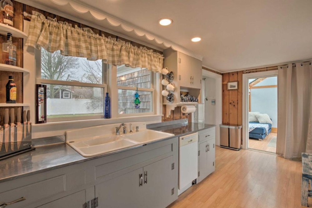 Waterfront Cape Cod Home with Sunroom and Fire Pit Image 10