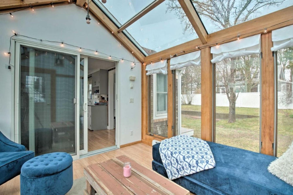 Waterfront Cape Cod Home with Sunroom and Fire Pit Image 11