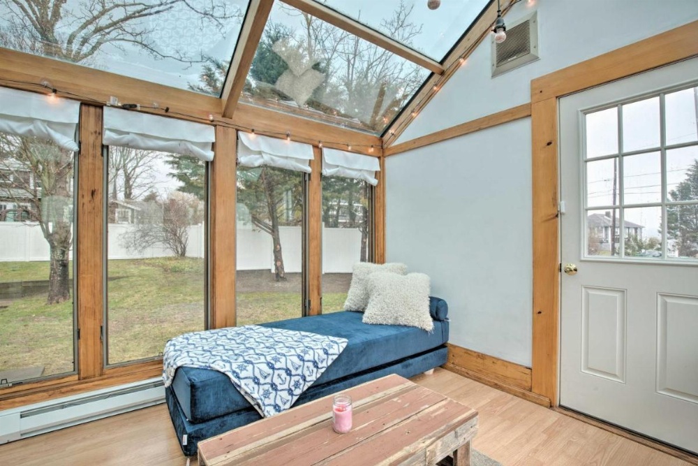 Waterfront Cape Cod Home with Sunroom and Fire Pit Image 12