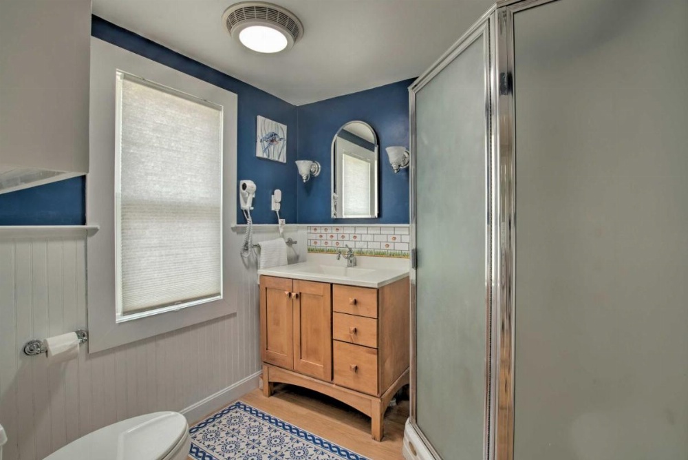 Waterfront Cape Cod Home with Sunroom and Fire Pit Image 19