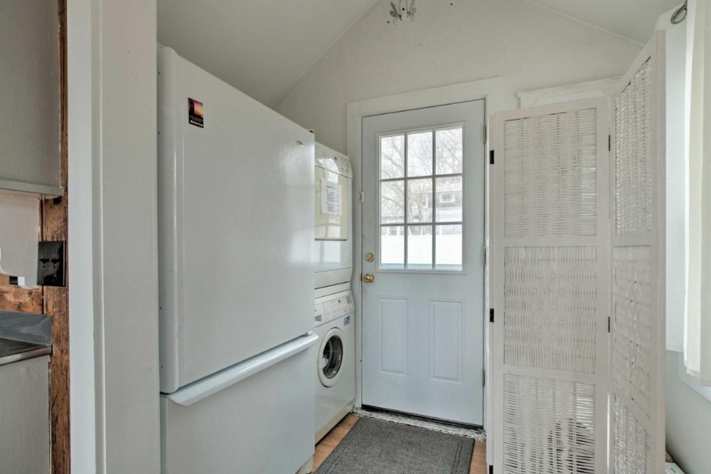 Waterfront Cape Cod Home with Sunroom and Fire Pit Image 21