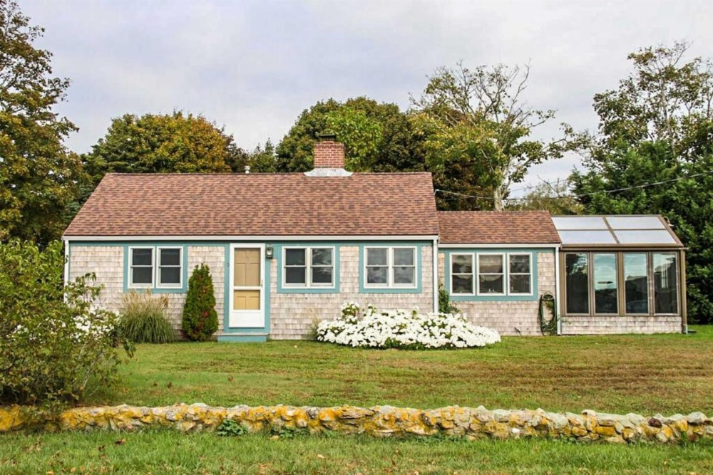 Waterfront Cape Cod Home with Sunroom and Fire Pit Image 22
