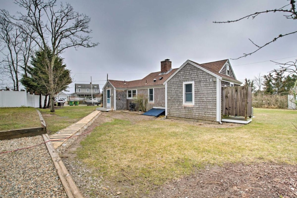 Waterfront Cape Cod Home with Sunroom and Fire Pit Image 23