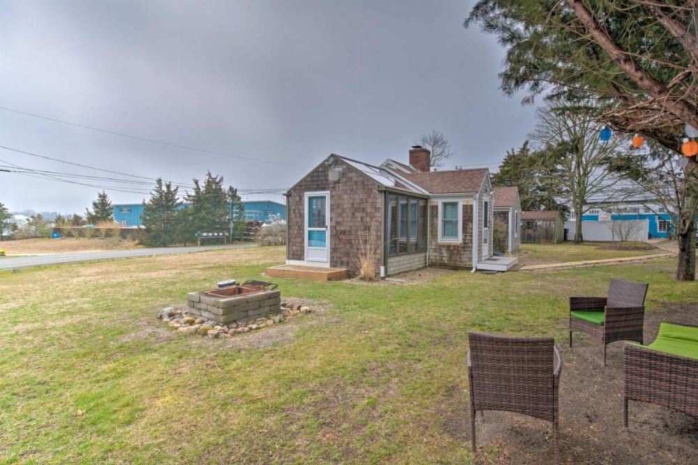 Waterfront Cape Cod Home with Sunroom and Fire Pit Image 24