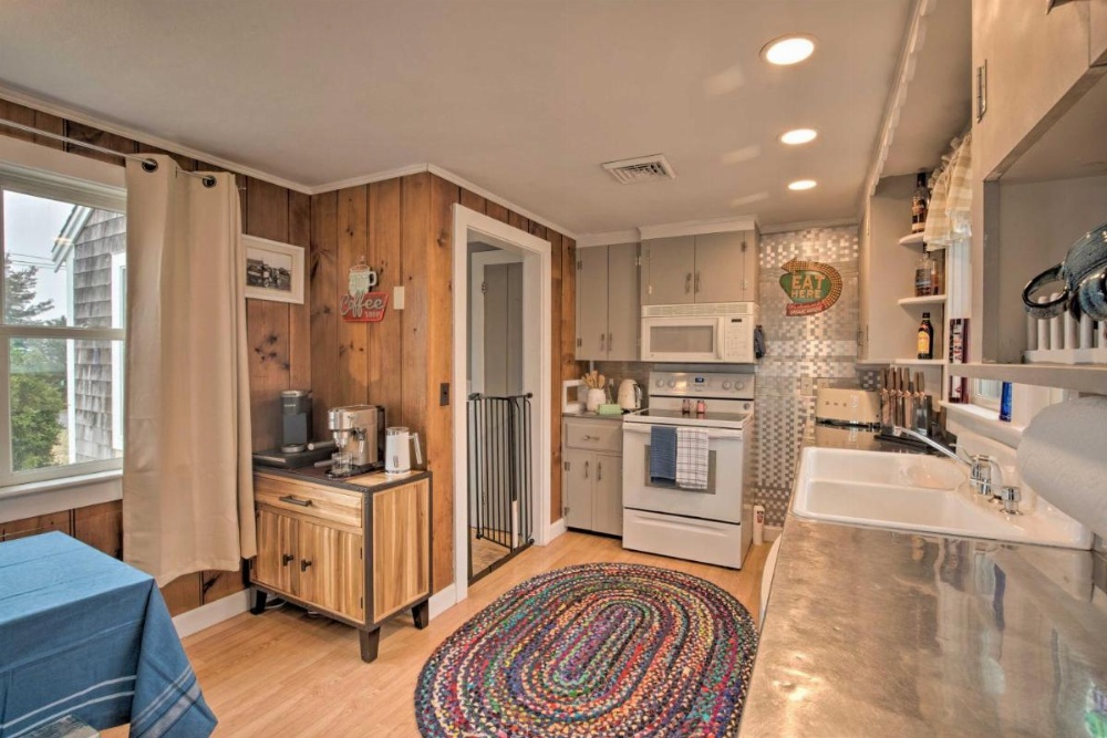 Waterfront Cape Cod Home with Sunroom and Fire Pit Image 6
