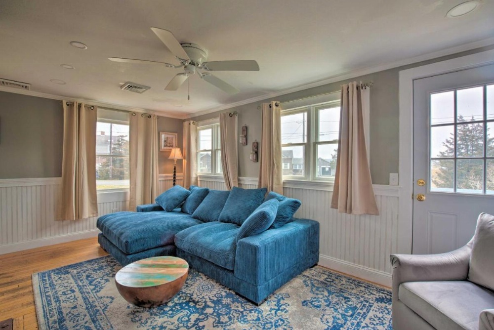 Waterfront Cape Cod Home with Sunroom and Fire Pit Image 7